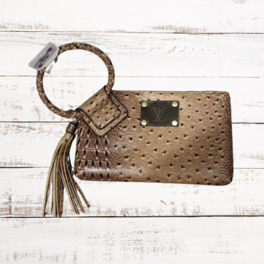 Tasseled and Upcycled Louis Vuitton Wristlet