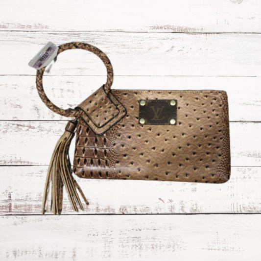 Tasseled and Upcycled Louis Vuitton Wristlet